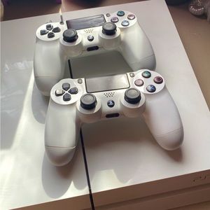 PS4 console with controllers